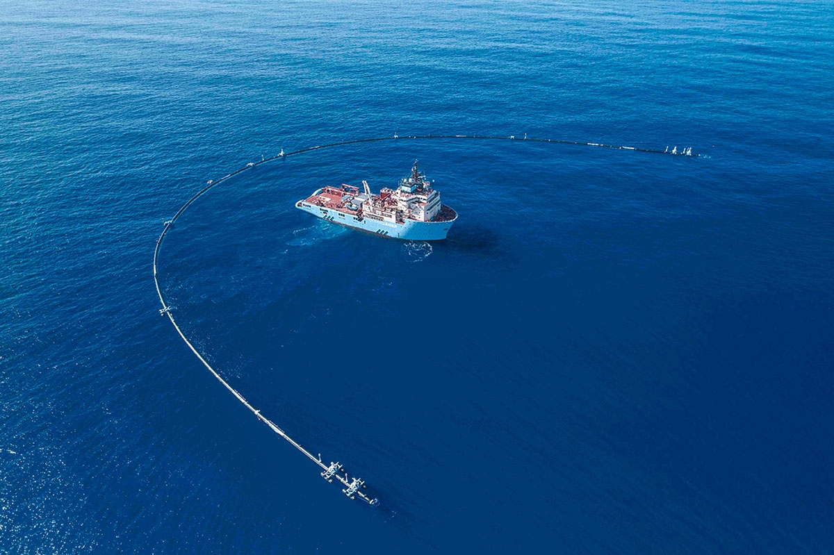 The Maersk Launcher, DeepGreen's support ship. with the Ocean Cleanup System 001.